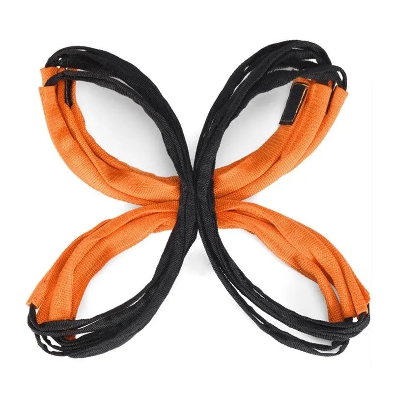 Plastic children's butterfly agility ladder and jump grid fitness equipment set on grass.