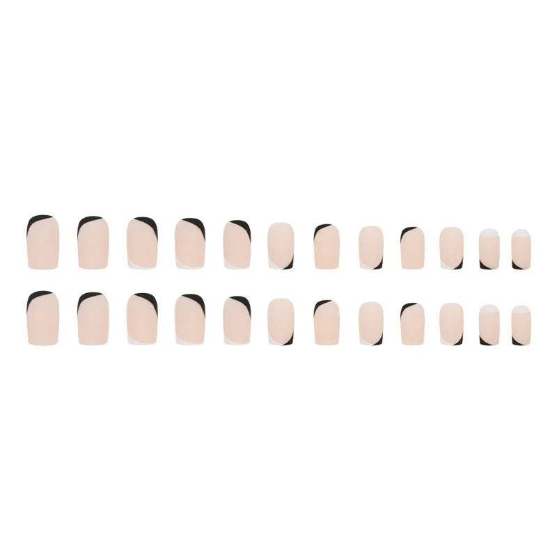 W644 black and white frosted matte press-on false nails set on a hand