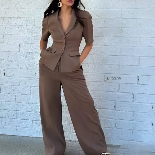 Brown polyester two-piece suit with trousers and matching top slim fit waist