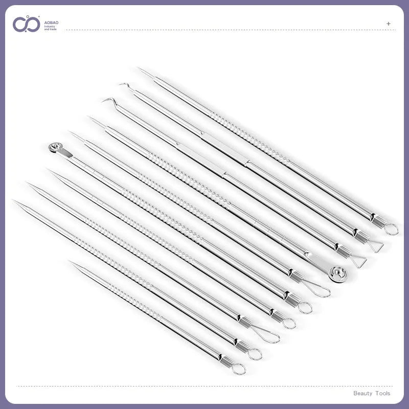 Four silver metal acne needles with pointed tips for skincare extraction.