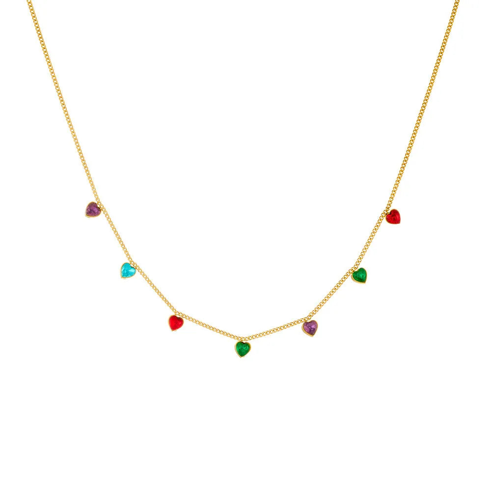 Gold-plated stainless steel necklace with a heart pendant on an adjustable chain.