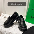 British style wide fat foot loafers in patent leather and matte finish, showing rubber sole and slip-on design.