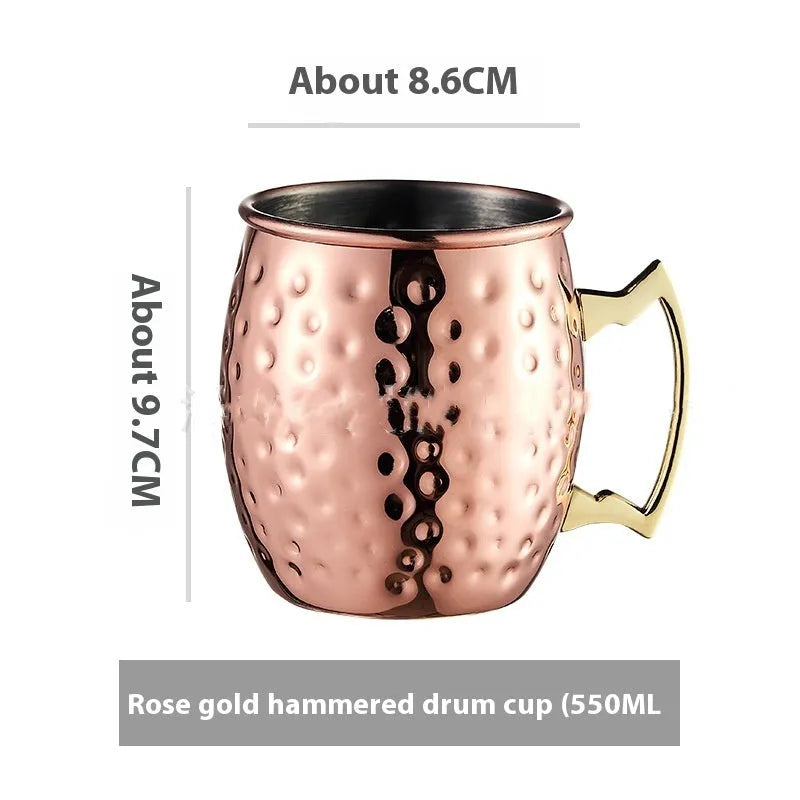 Stainless steel Moscow Mule cup with copper plating in hammer point style showing metallic finish.