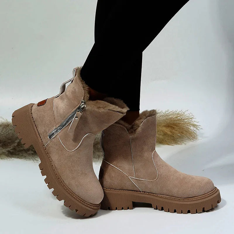 Black women's high-top snow boots with side zipper, faux suede upper, and non-slip rubber sole.