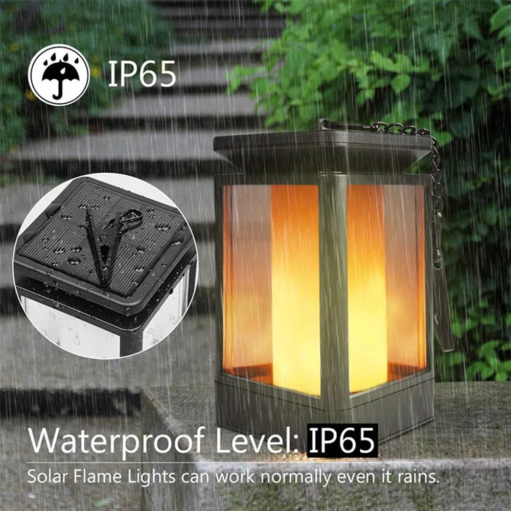 Black antique flame style solar LED outdoor street lamp with solar panel on top.