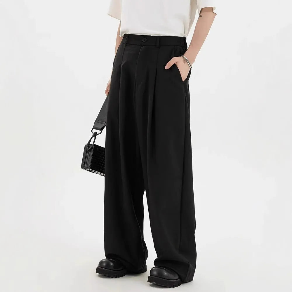 Men's straight casual trousers in black, loose fit, front view, polyester blend fabric