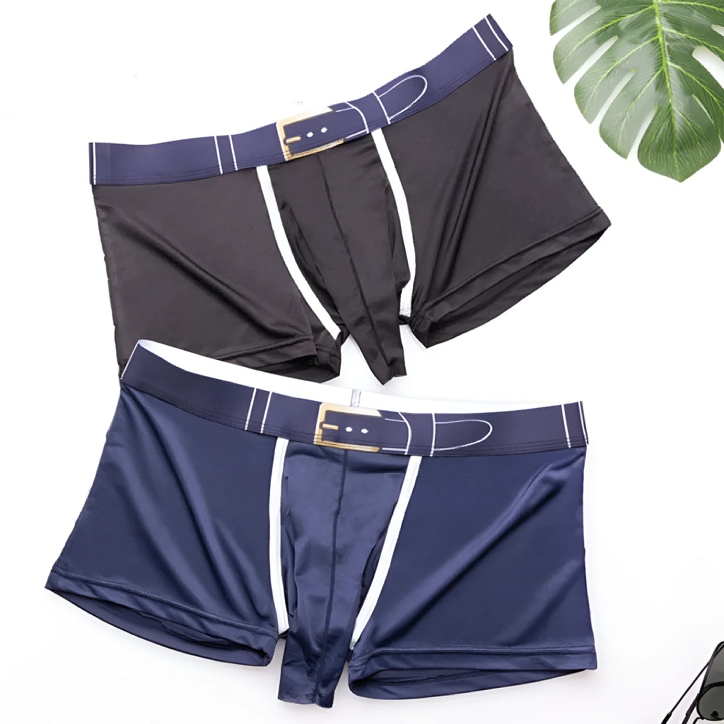 A pair of solid colour men's ice silk boxers laid flat, showing the mid waistband design.