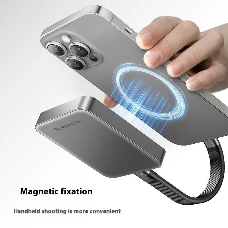 Grey magnetic mobile solid state drive with USB-C cable and magnetic suction ring.