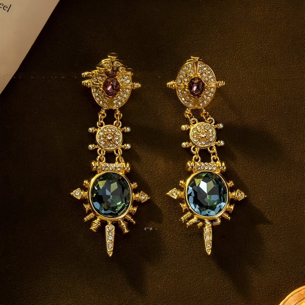 Gold alloy retro geometry stud earrings with round shape and diamond treatment.