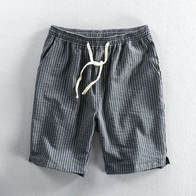 Men's striped casual cotton shorts with an elastic waistband shown in multiple colour options.