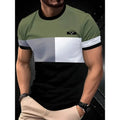 Man wearing a loose-fit short sleeve t-shirt with a raised digital 3D printed stripe pattern in blue.
