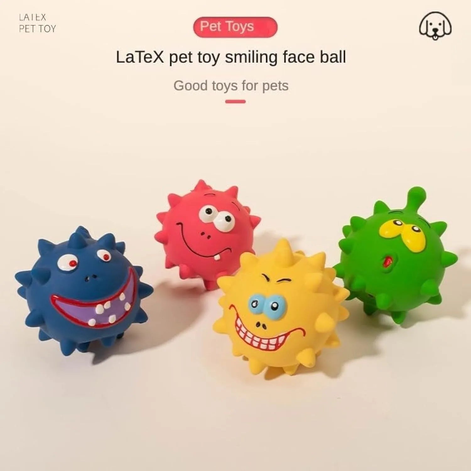 Four coloured natural latex squeaky dog balls with cute faces, each measuring 7.5cm