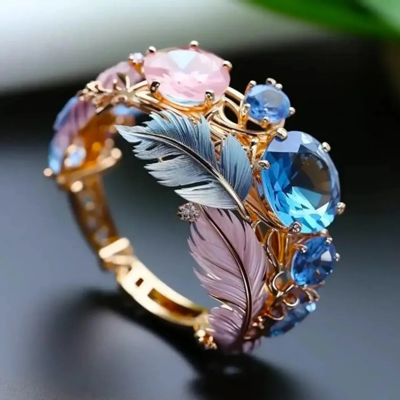 Brass geometric feather ring with embossed colourful design and inlaid zircon stones