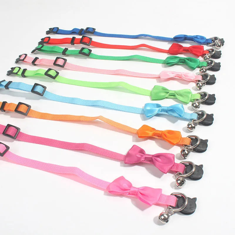 Multi-colour striped nylon bow collar for cats with bell decoration in adjustable design