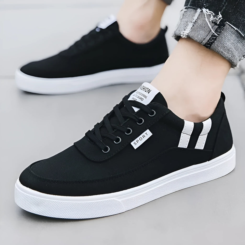 Men's black cloth cover low top canvas shoes with lace-up closure and rubber sole