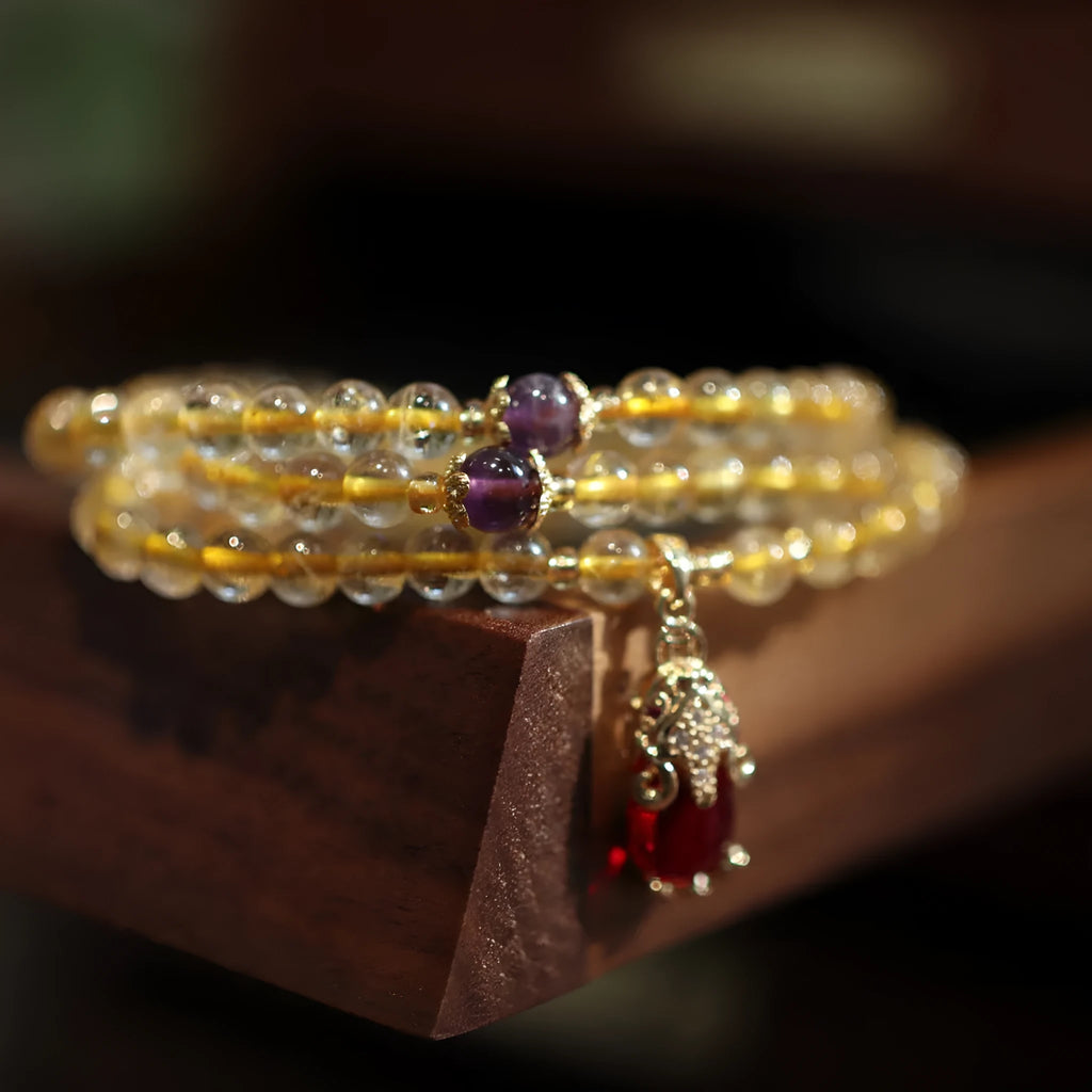 Natural Brazilian gold rutilated quartz bracelet with three gold rings in Chinese style design