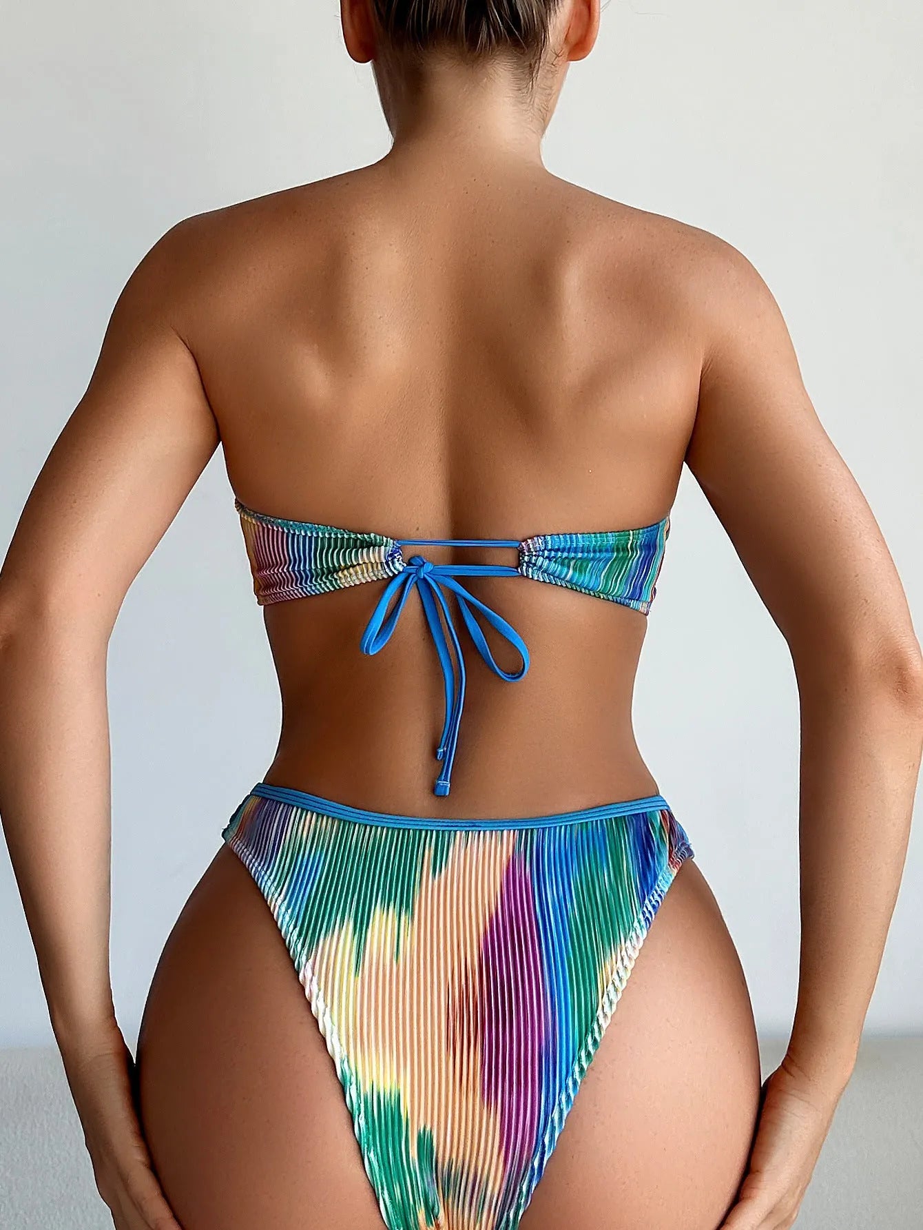 Colour printed polyester bikini set with a tube top and matching briefs.