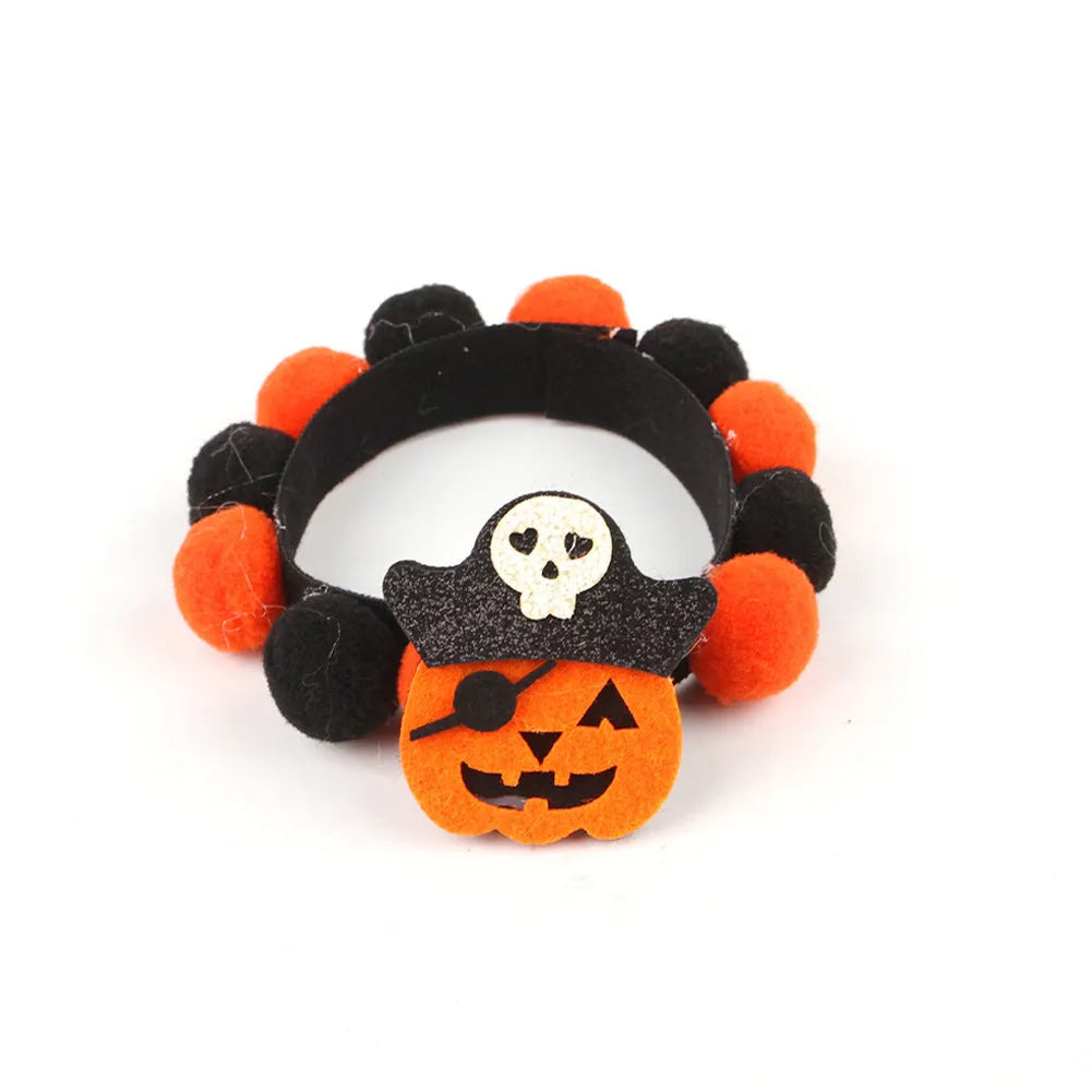 Halloween pet collar with fluffy fur ball accessory in pumpkin design, shown in size M