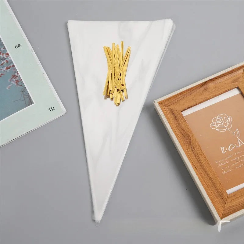 Clear triangle-shaped plastic packaging bag with a white tie wire closure, shown in three different sizes.