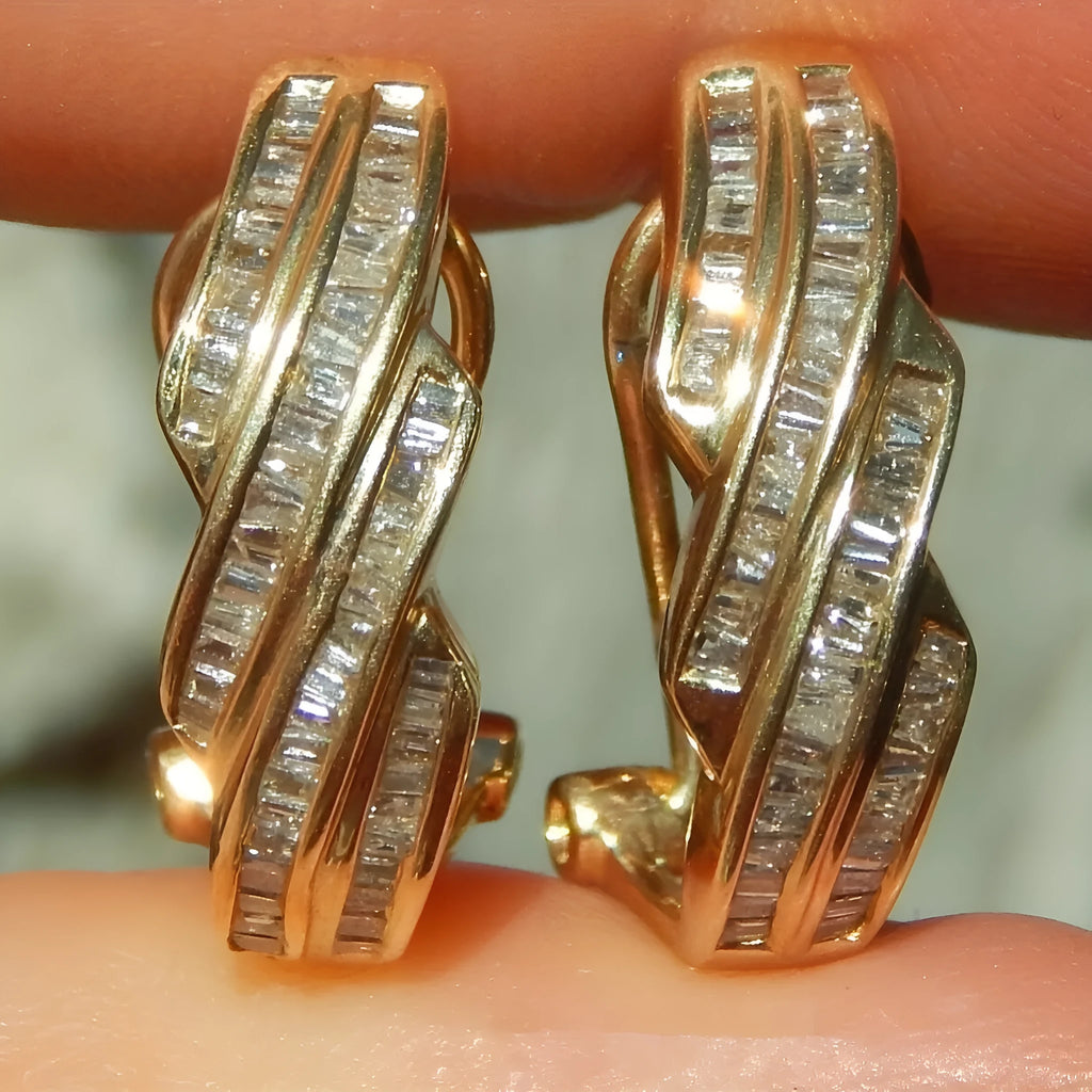 A pair of gold-coloured geometric earrings with round details, made from solid copper.
