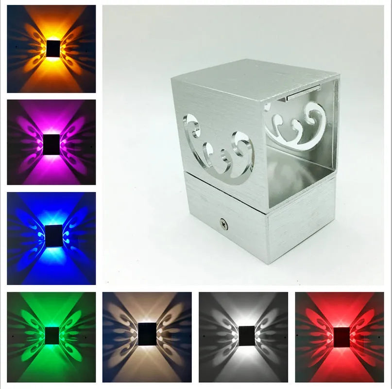Butterfly-shaped LED wall lamp with aluminium shade in modern style