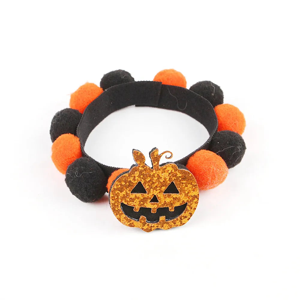 Halloween pet collar with fluffy fur ball accessory in pumpkin design, shown in size M