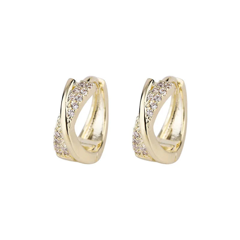 Copper geometric drop earrings with zircon detailing in 14K yellow finish