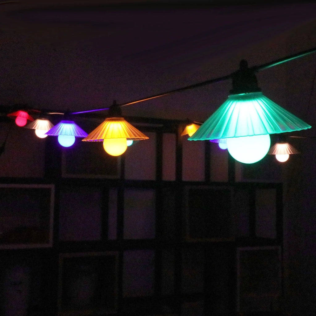 Outdoor LED string lights with flower-shaped bulbs in warm white and coloured options for garden and camping