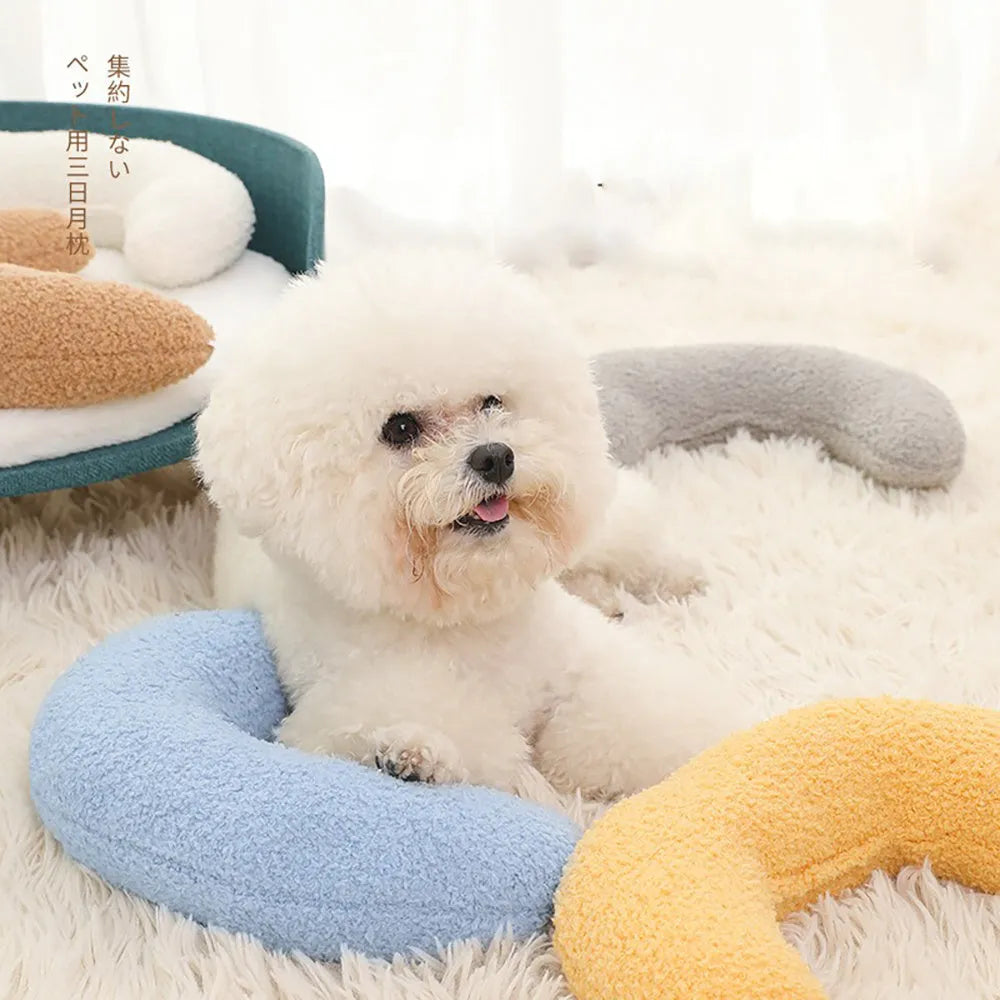 Blue U-shaped cat pillow with adjustable fabric collar for feline sleeping comfort