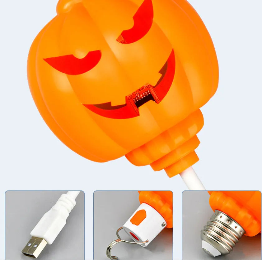 Plastic pumpkin-shaped lamp with USB charging cable, showing purple light option.