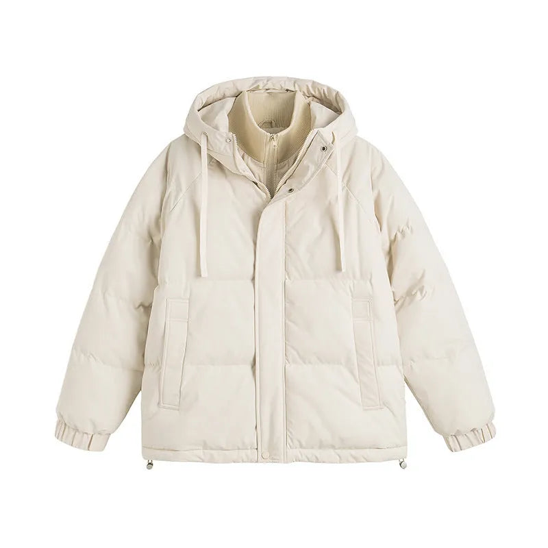 A loose two-piece cotton-padded winter coat in a solid colour with side seam pockets.