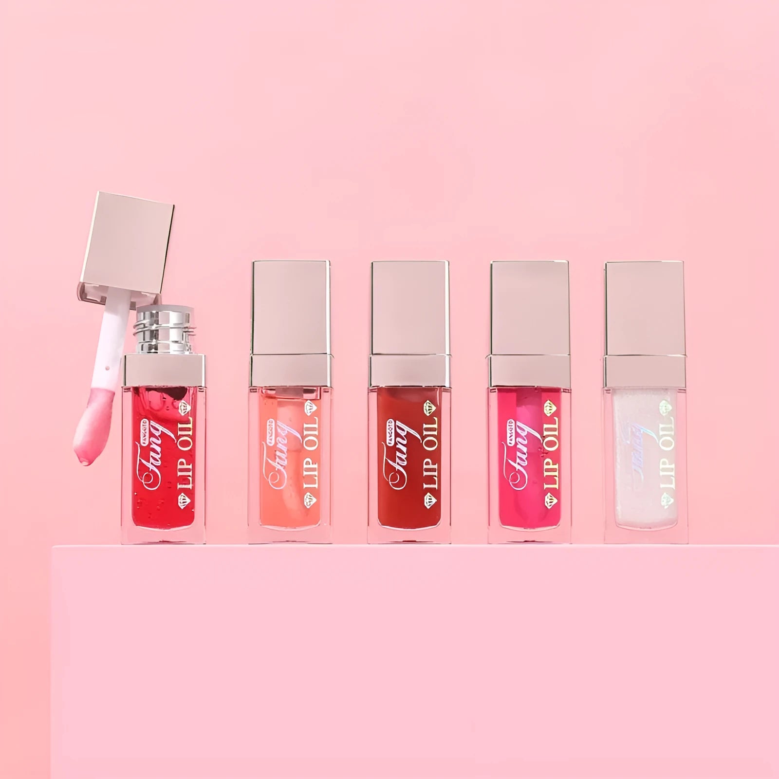 Five colour mint lip gloss tubes with moisturising formula and applicator