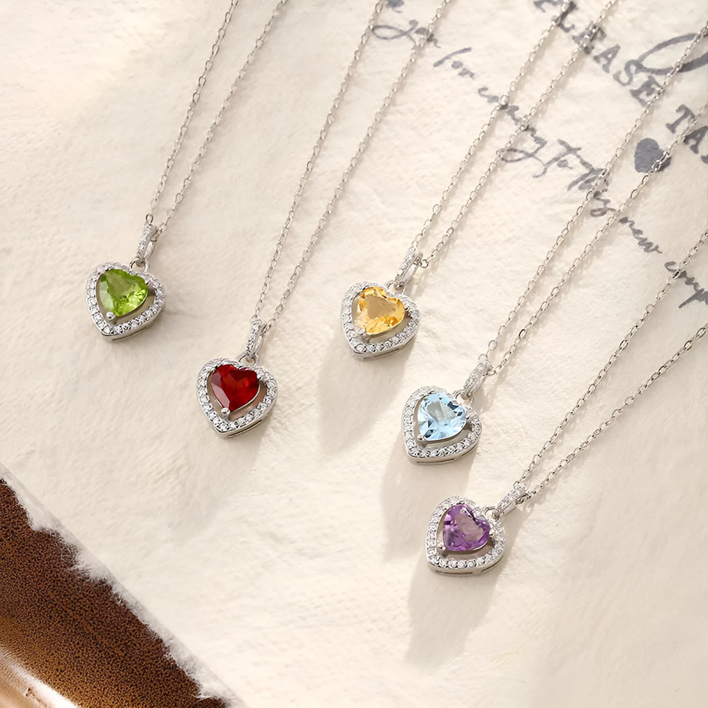 S925 sterling silver heart necklace with natural gemstone pendant on an adjustable cross chain.