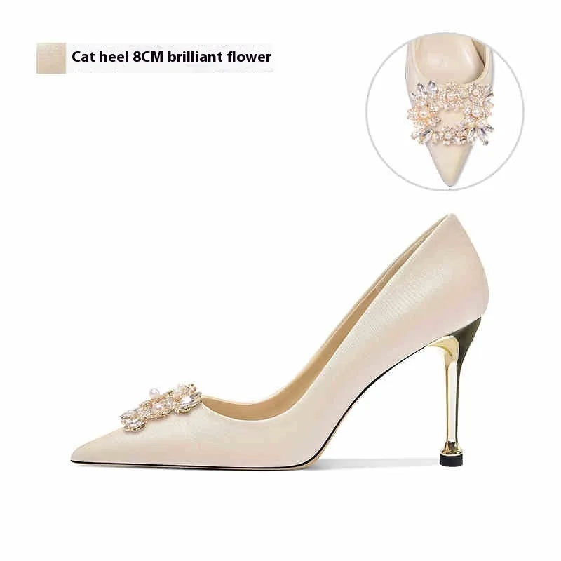 Women's pointed-toe high heel shoes with rhinestone decoration on cloth upper, showing stiletto and cat heel style options.