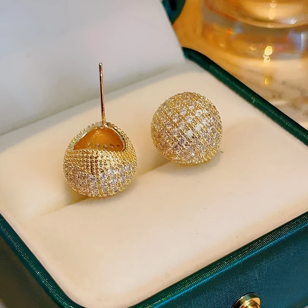 Little Golden Beans geometric drop earrings with spherical elements and diamond detailing in gold and white colours