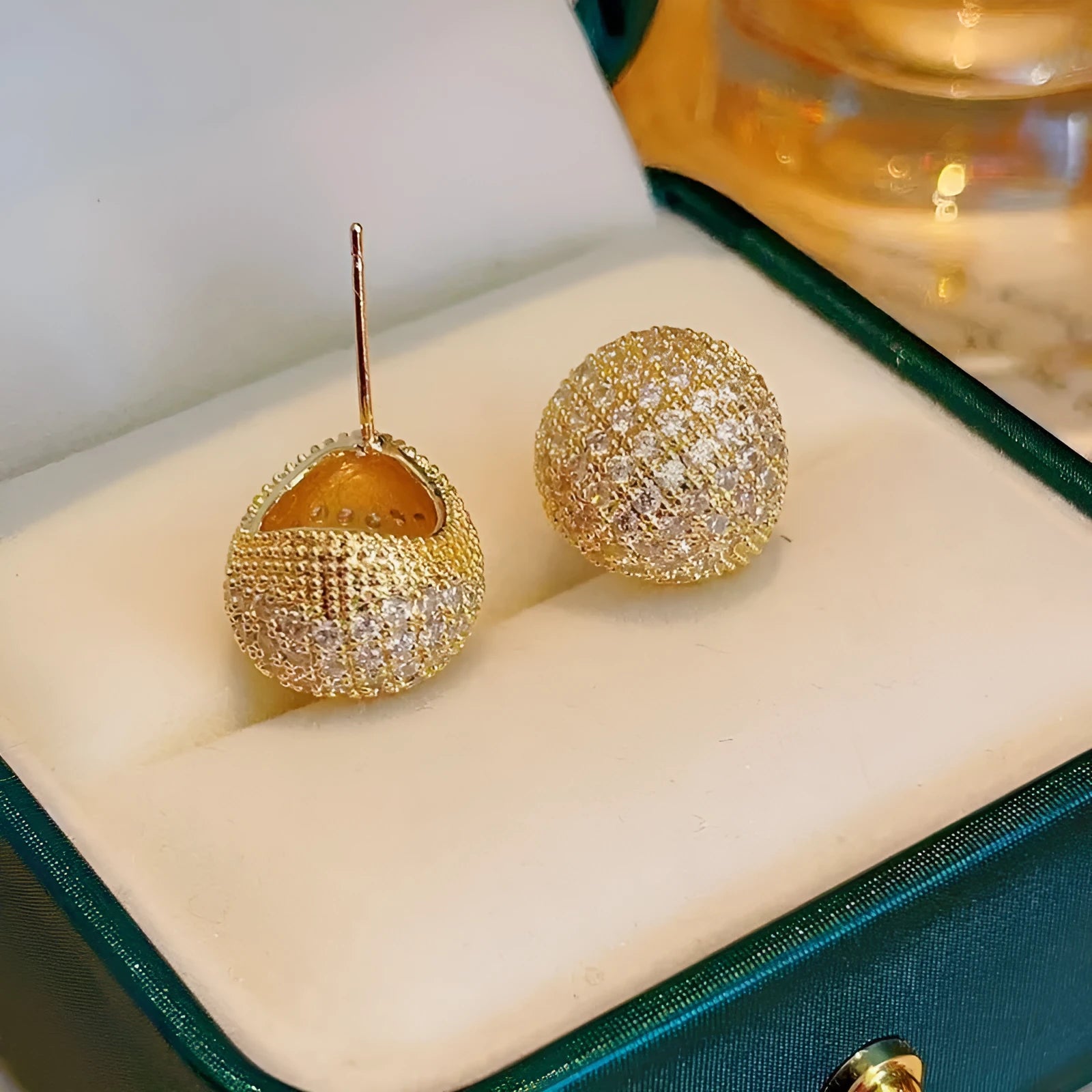 Little Golden Beans geometric drop earrings with spherical elements and diamond detailing in gold and white colours