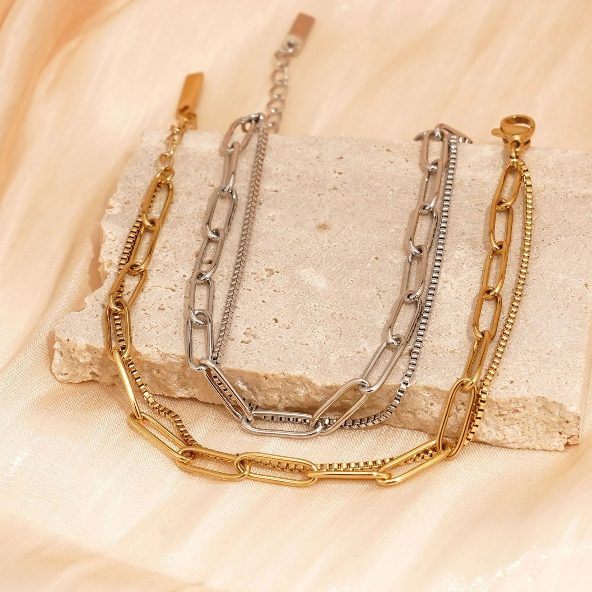 Women's double layer stainless steel bracelet with geometric design in gold or silver finish