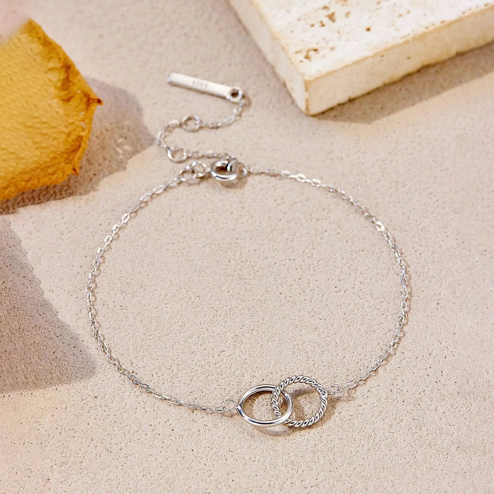 S925 sterling silver interlocking bracelet with round diamond inlay for women in 18K gold finish