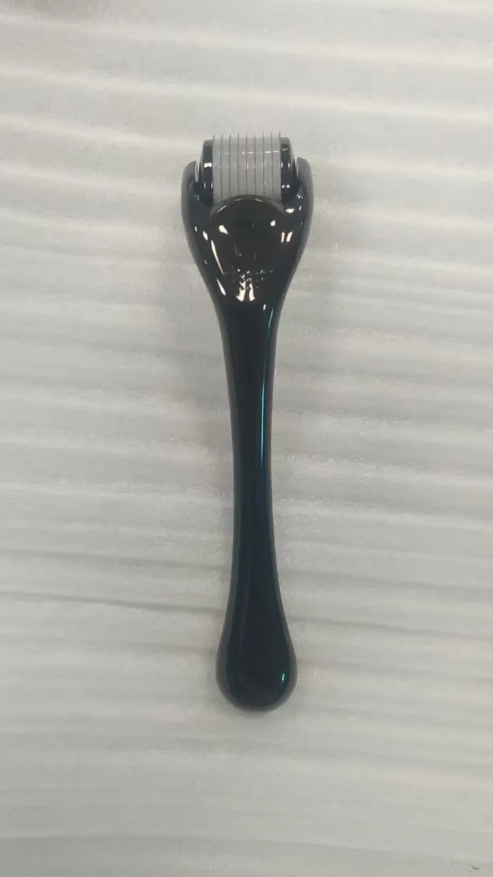 Black handle micro needle roller with purple wheel showing 540 stainless steel needles for dermaplaning