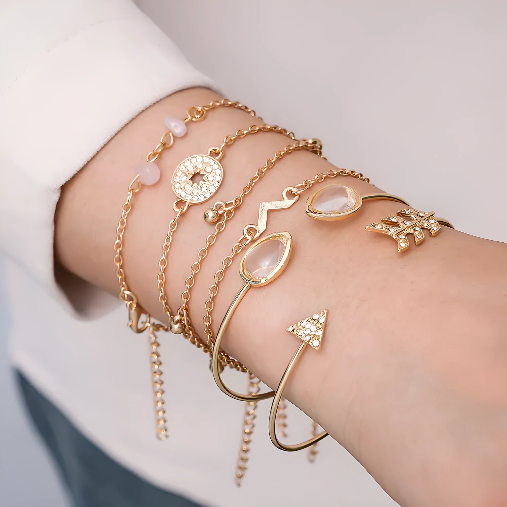 6 piece gold women's bracelet set with water droplet and arrow-shaped charms on zinc alloy construction