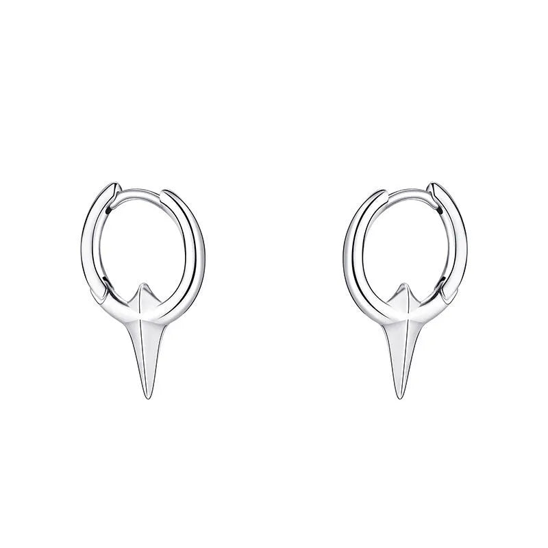 Women's geometric star-shaped ear clip with an electroplated platinum or white gold finish.