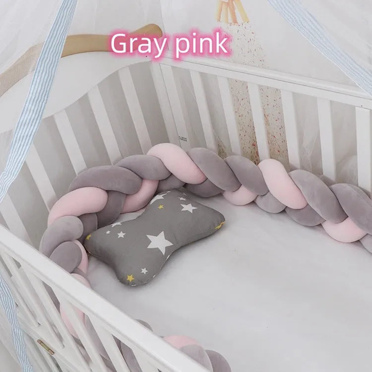 Soft spandex velvet baby crib bumper protector shown in a light grey colour, shaped around white crib bars.