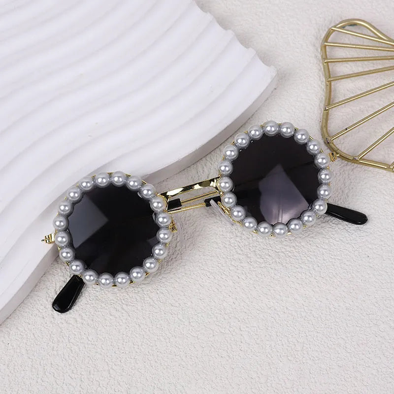 Pearl-rimmed round sunglasses for cats and dogs in multiple colours as costume accessories
