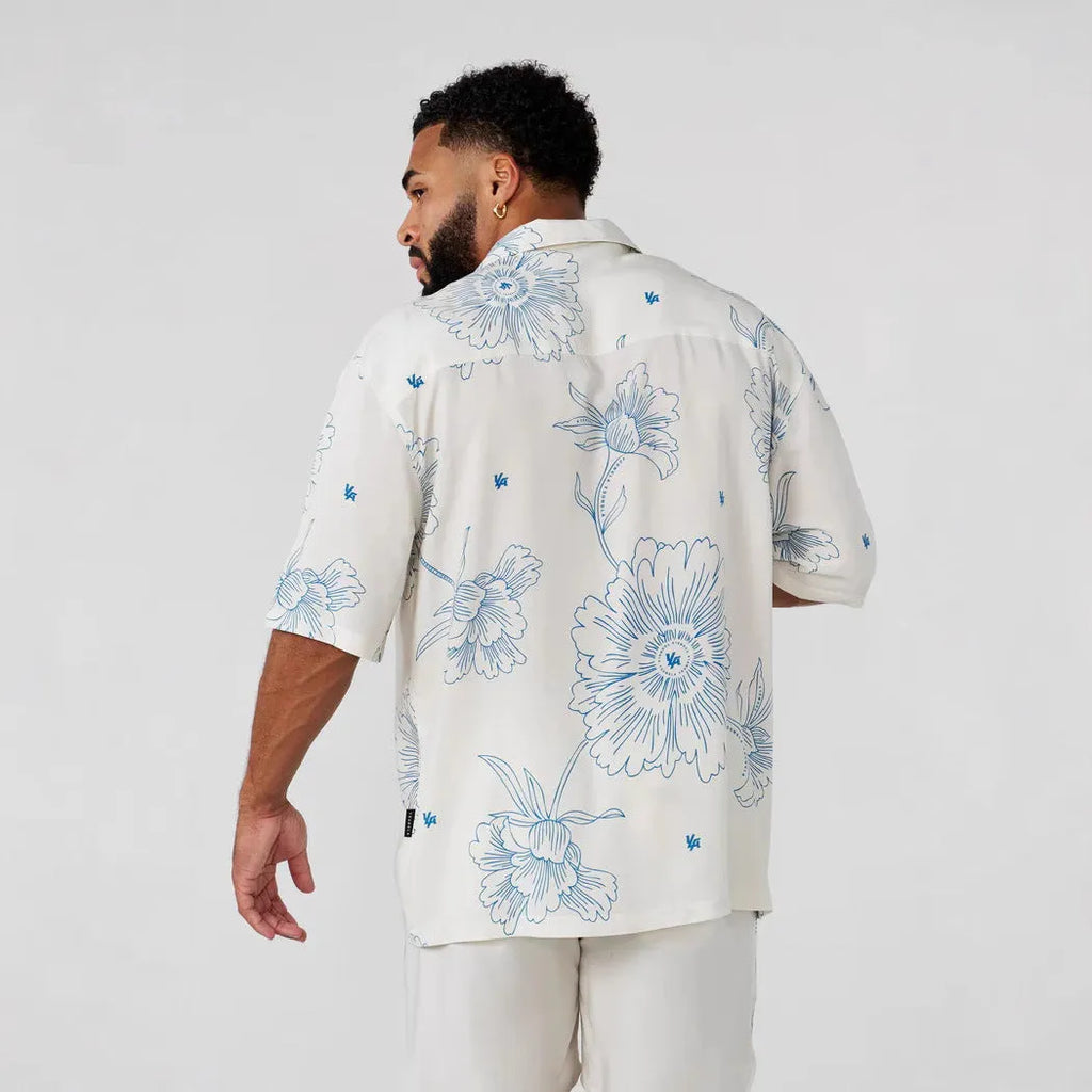 Men's printed casual top with flower pattern, loose cardigan style, and short sleeves in elastic polyester fabric