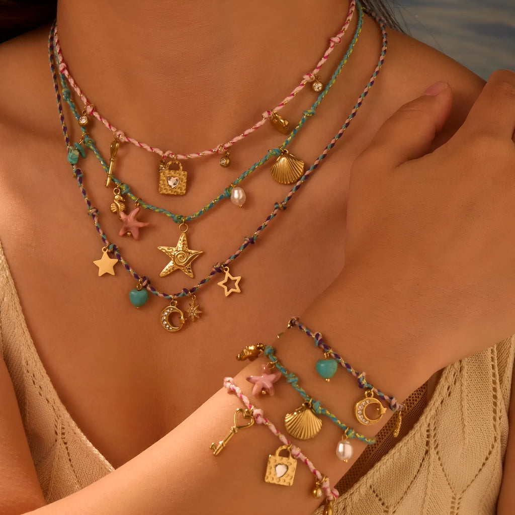 Handmade purple, pink, or blue braided rope and steel necklace or bracelet with heart, star, or geometric pendant.