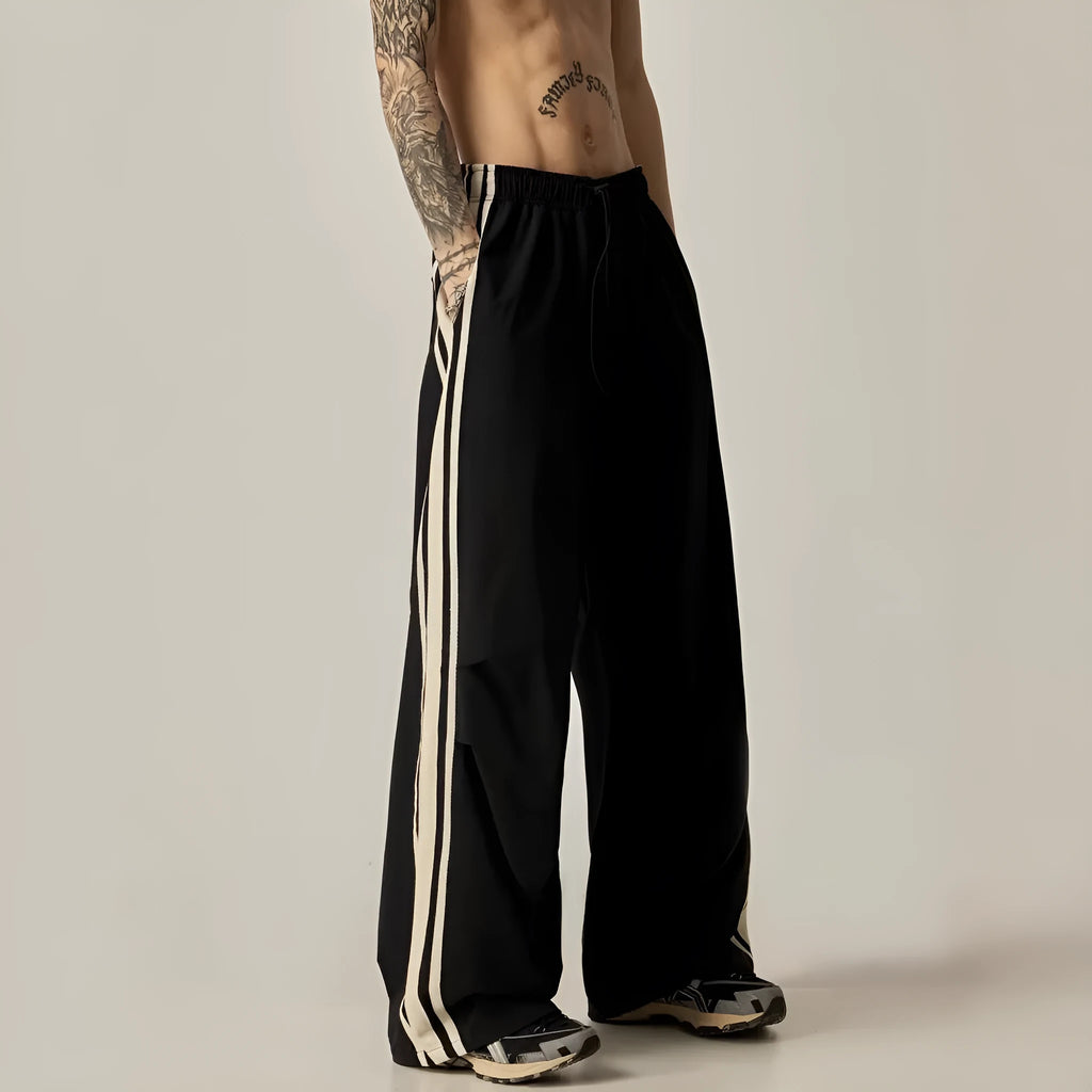 Men's black wide-leg climbing trousers with high waist and straight-leg design for summer outdoor activities