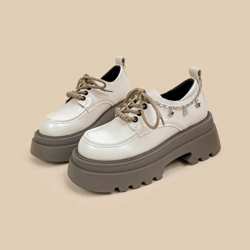 White platform Mary Jane shoes with thick chunky heel and front lace-up in XINGX bear colour