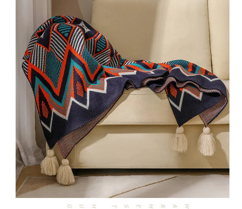 Bohemian-style acrylic sofa blanket with tassel edges in geometric pattern or solid colour options