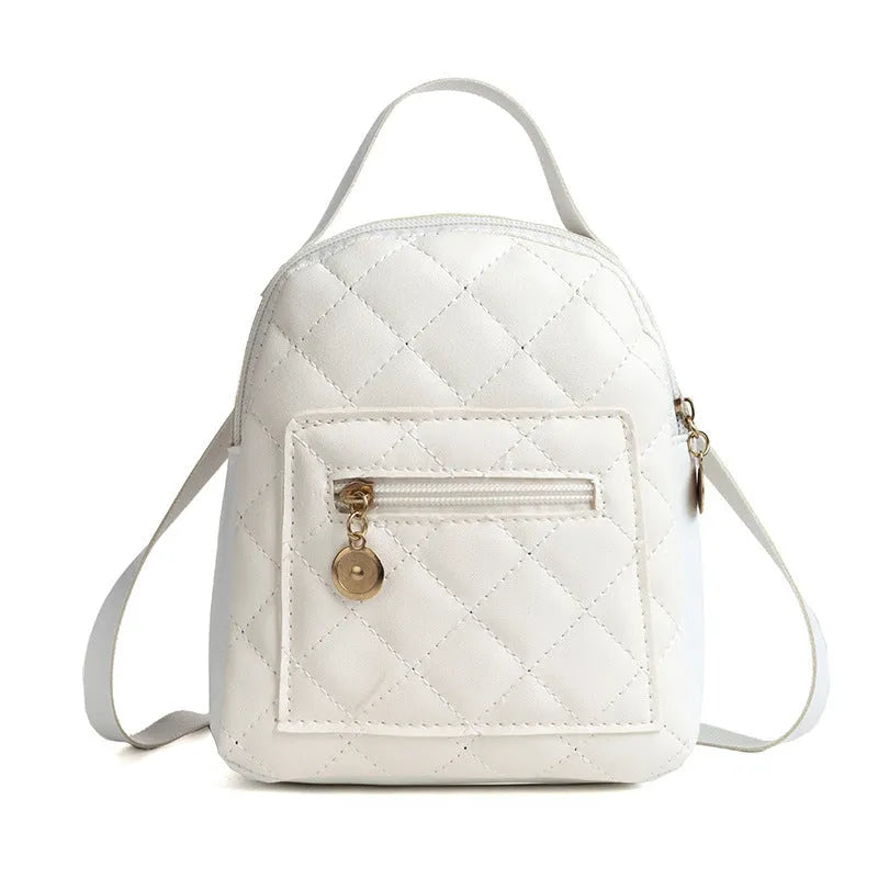 Hardback square Korean style embroidered girls' backpack in pink with soft handle.