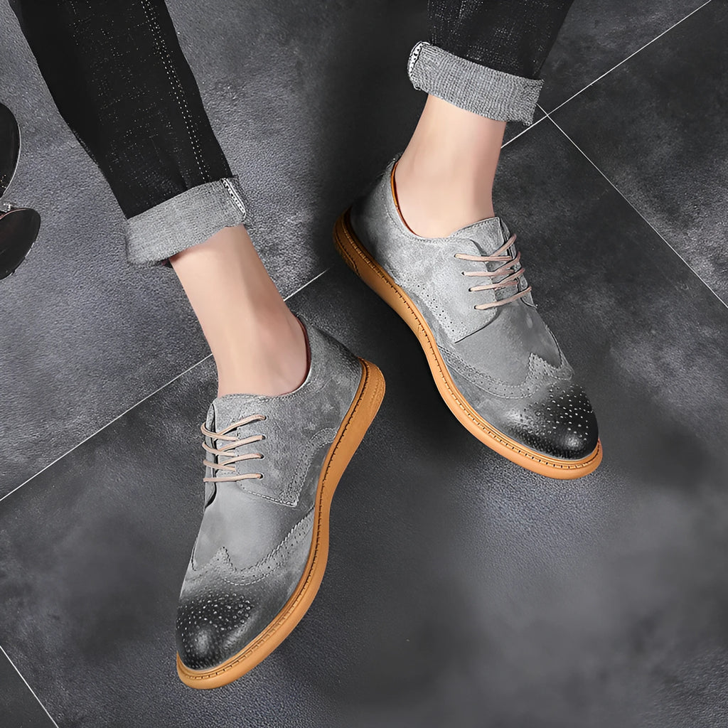 Men's black genuine cowhide leather low top business shoes with lace-up design and rubber sole.